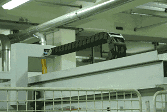 Flexible cable on furniture manufacturing machine